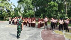 Babinsa Koramil 1002-04/Labuan Amas Selatan Bina Karakter Siswa Melalui Pramuka