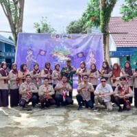 Babinsa Barabai Dorong Pembentukan Karakter Siswa Lewat Perkemahan Pramuka