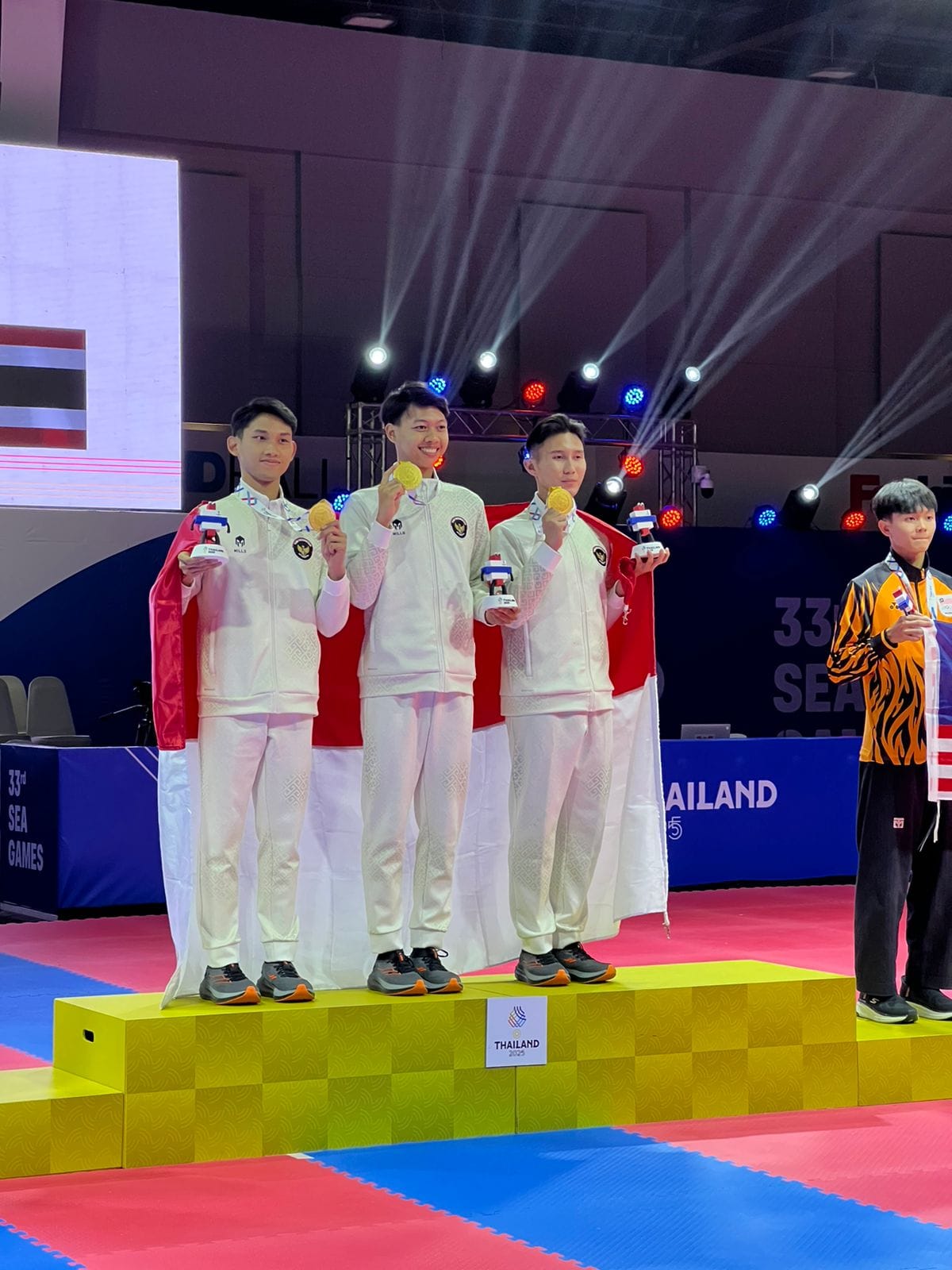 Alfi Kusuma Anggota TNI Atlet Taekwondo Meraih Medali Emas Sea Games 2025 Thailand