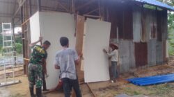 Pengerjaan RTLH di Desa Badak Mekar Terus Berlanjut, Satgas TMMD Ke-128 Kodim 0908/Bontang Lakukan Pemasangan Dinding