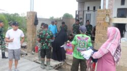 Kebersamaan Personel Satgas TMMD Ke-128 Kodim 0908/Bontang dan Warga Terjalin Hangat di Tengah Pengecoran Jalan