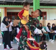 Senyum Polos Anak-Anak Kesongo, dan Sentuhan Hangat Anggota Satgas di Sela TMMD 129 Bojonegoro