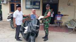 Pastikan Tepat Sasaran, Babinsa Koramil 0908-04/Marangkayu Kawal Penyaluran Bantuan Beras Bulog Di Wilayah Binaan